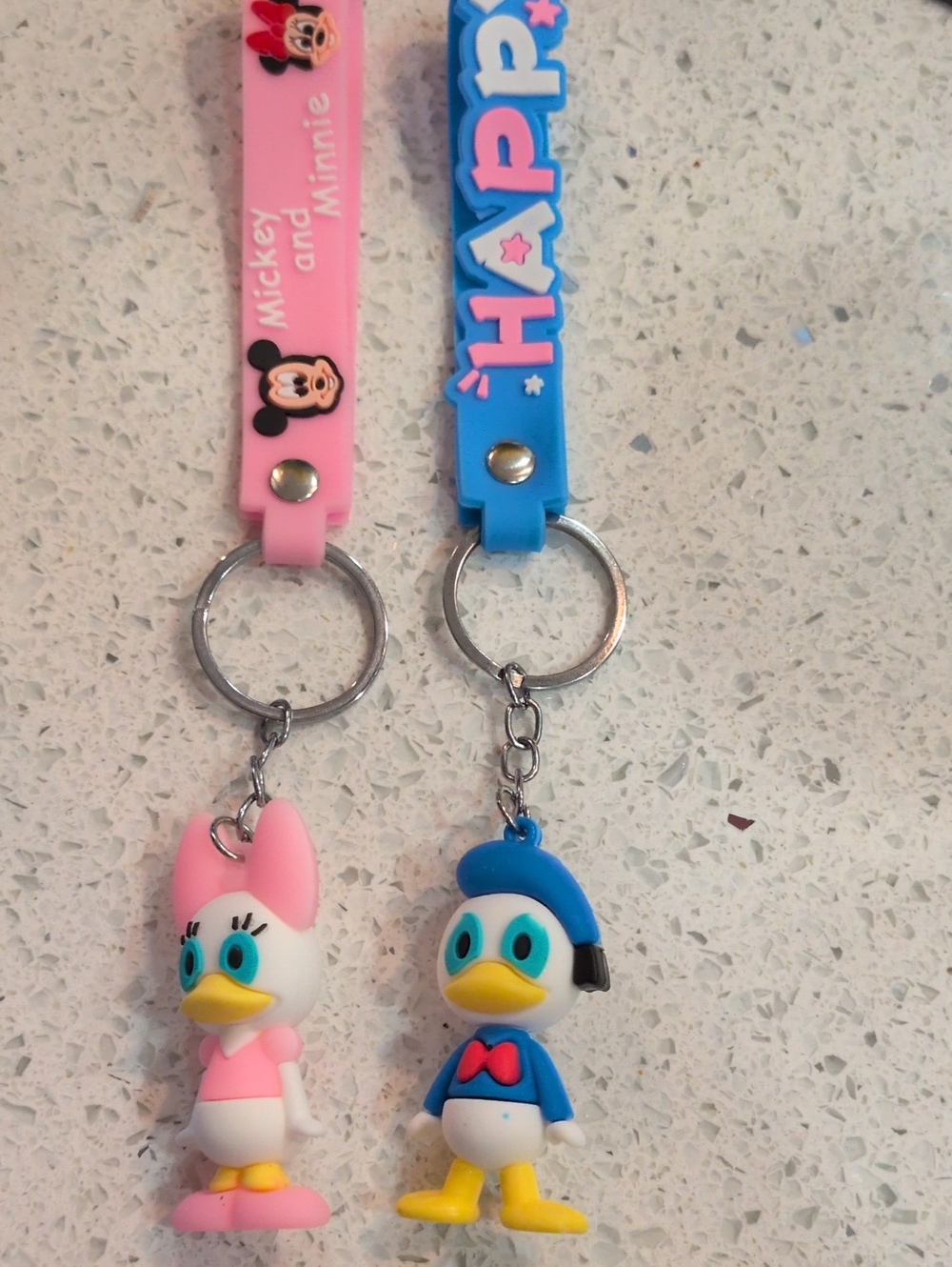 DISNEY Pink Daisy Duck & Blue Donald Silicone Keychain Set